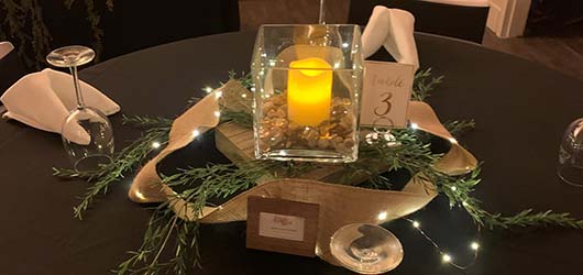 A candle at table 3