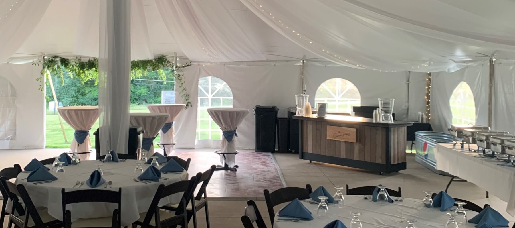 Bridal tent with tables set up for an event